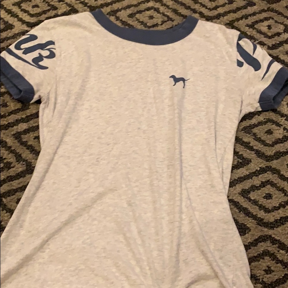 Grey and blue t shirt.